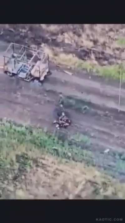 Drone drop on Russian soldiers. One soldier is still alive, but terminally wounded. Ukraine, 2024.