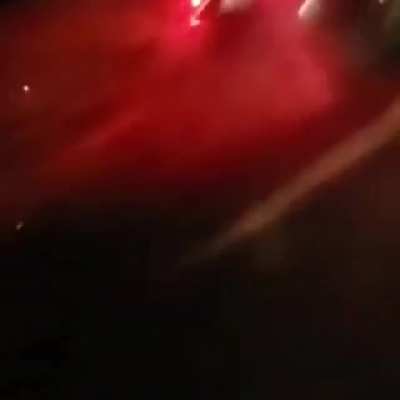 Motorcyclist dangerously maneuvering is hit by a passing car on a Brazilian highway