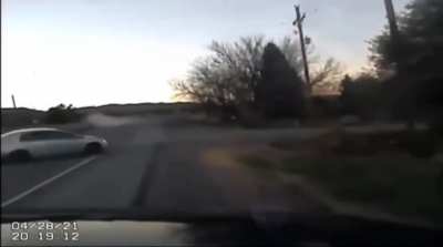 Drunk driver fishtailing backwards into County Sherrif's patrol car