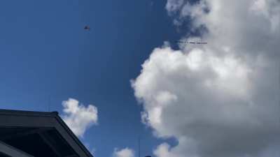 A Pilot doing the lords work over Disney Springs mall, in Florida: