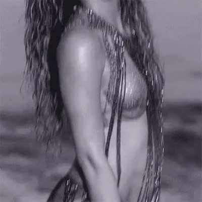 I love Shakira's naughty look as she bounces her fat ass