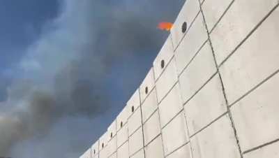 IDF launching fireballs via catapults over the barrier wall on the Lebanese border in order to cause fire and burn the natural cover for hezbollah 