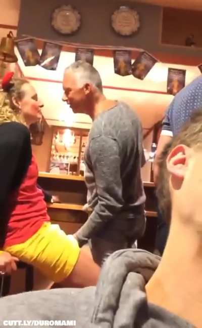 Older Couple at a Bar
