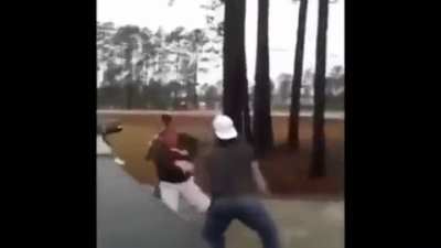 Road rager instigates a 2v1 fight and promptly gets destroyed. Then pulls out a handgun as the people he attacked are walking away