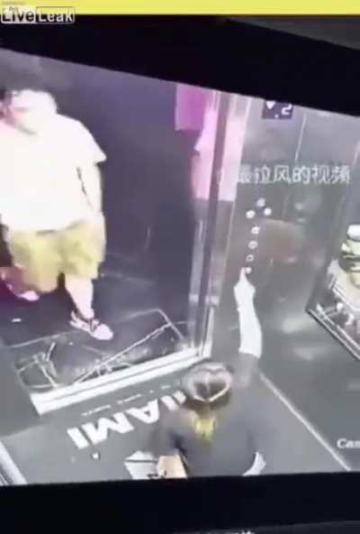 women piss in elevator