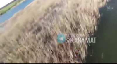 RU POV: Kherson Fisherman discombobulates a Russian drone by throwing a well-aimed fish at it