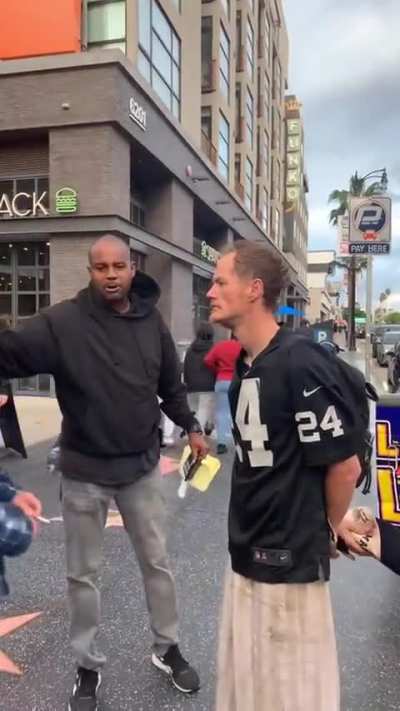 Dude spits on a homeless man’s face and then throws a lit cigarette at him