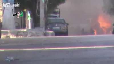 Syrian rebel soldier does an insane Hit and Run shot on a T-72 SAA tank ,location: douma, syria .early 2014