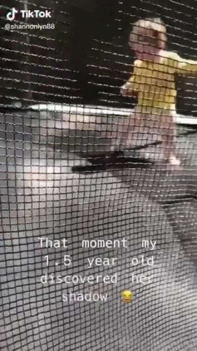 Little kid afraid of her own shadow