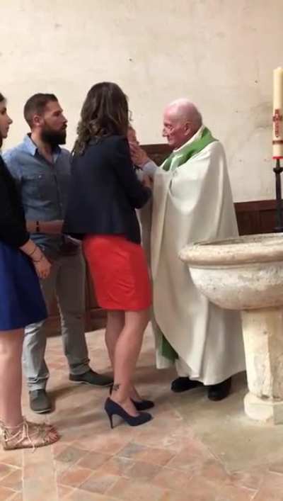 Priest slapping then suffocating a baby... because... Jesus?