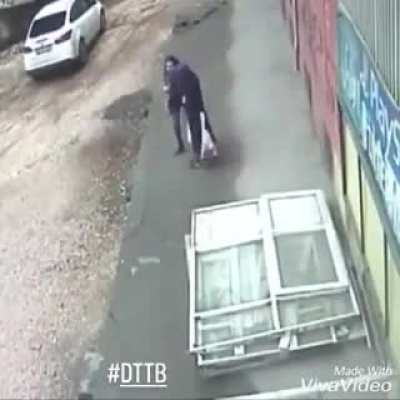 Two women stop for a chat in the street
