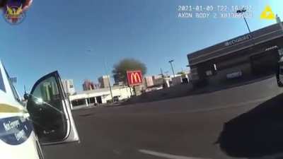 Police officer one taps armed man who's holding a baby as a hostage