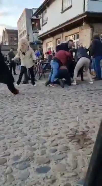 Group of women settle things the old fashioned way.