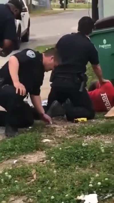 Cop plants drugs on suspect then freaks out when he realizes he is being filmed. He got away with it.