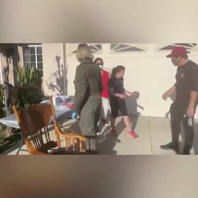 Cops administering forced vaccines on the mentally handicapped