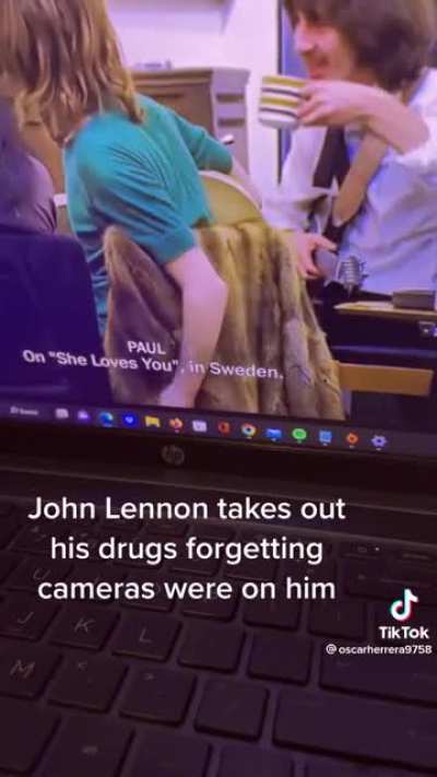 John Lennon takes out drugs & remembers they’re being filmed.