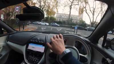 YouTuber tries out voice control in an Aston Martin.