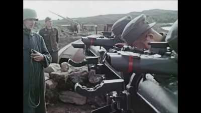 Original color footage of an 88mm Flak battery engaging Soviet bombers and claiming one of them circa 1944