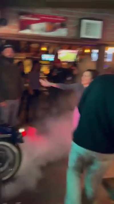 POS biker does a burnout inside a bar.