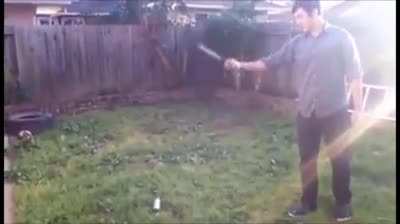 Throwing a knife at a spray paint can