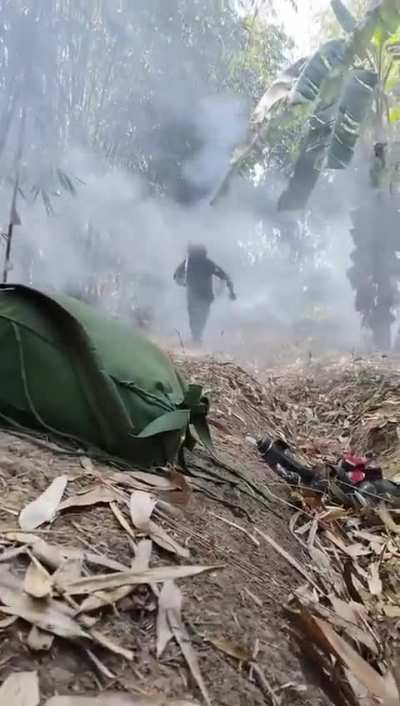 KIA (Kachin Independence Army) Fighter Giving his GoPro to a Battle Buddy before firing an RPG at Myanmar Junta Positions (Exact Date Unknown)