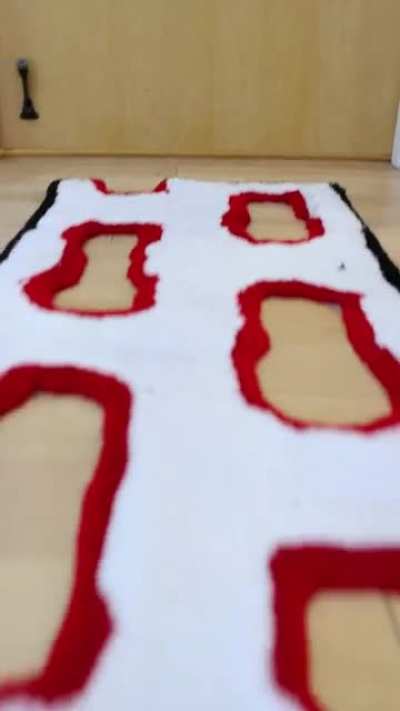 I build unnecessary products so I made a rug with footprint holes if your shoes are dirty.