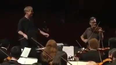Orchestra plays happy birthday for conductor