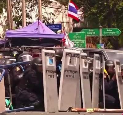 Hand grenade thrown at riot police