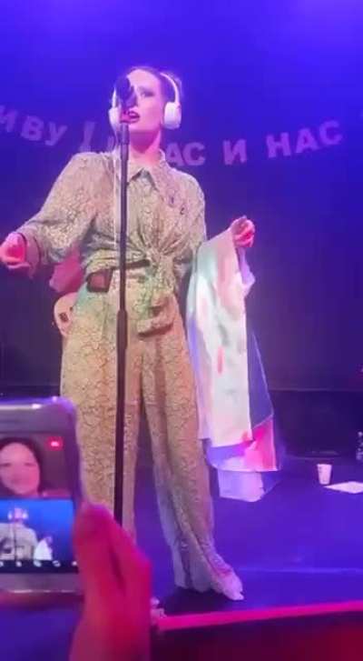 Russian singer Monetochka brought out a White<wbr>-Blue<wbr>-Whit<wbr>e on stage and led the crowd in a chant: 