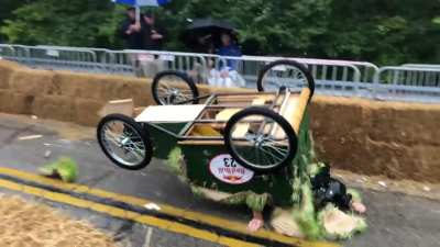 Man doesn’t land the jump at a soapbox race. I took this video a few years ago.
