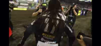 Rider celebrates his first race win after 14 years of trying