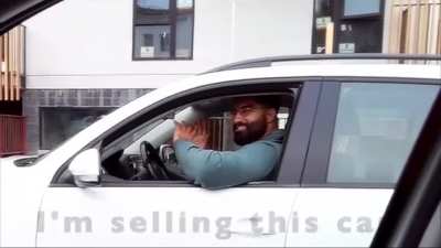 This man is too big for his car