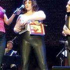 Here's Rachel Bloom fitting all of the object's that she can hold under her boobs.