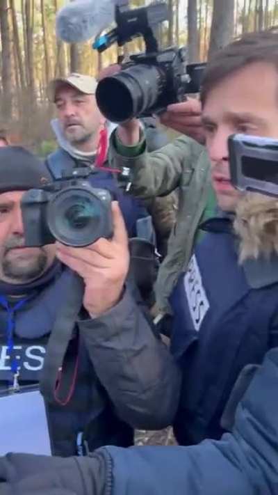 Journalists were shown the mass grave in the village of Motyzhyn in the Kyiv region, which was found after the retreat of the Russian military.