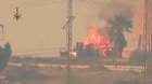 NLF fighters hit a Pro Assad BTR with an ATGM and the resulting fire causes the pickup next to it to catch fire. 14/02/2020.