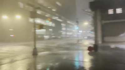 It’s raining so hard the manhole covers are being blown off…