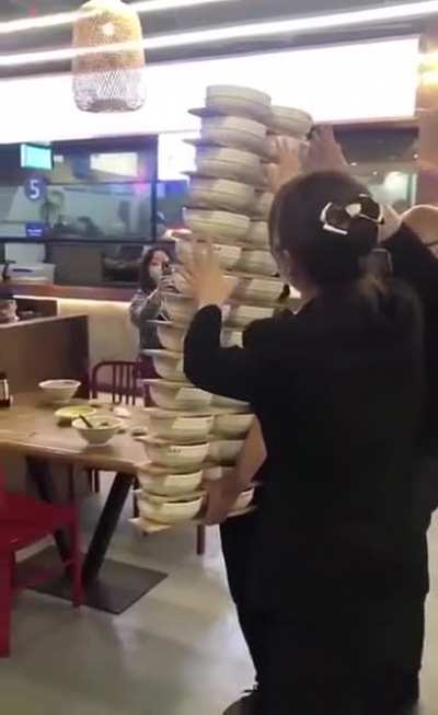 Waitress Plays Jenga With Noodles