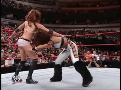 Maria gives Melina a wedgie