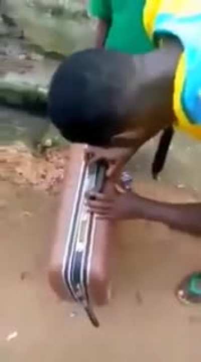 kid locked his friend inside a suitcase