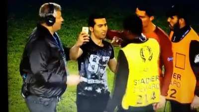 Cristiano Ronaldo waits for his fan's phone to work