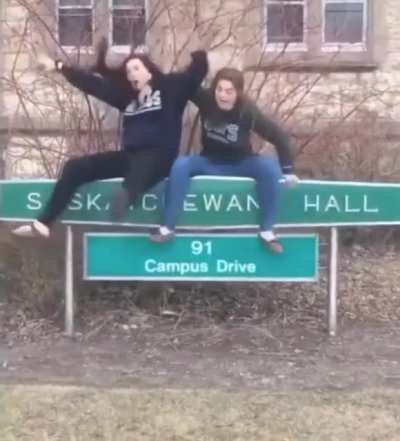 WCGW sitting on a sign