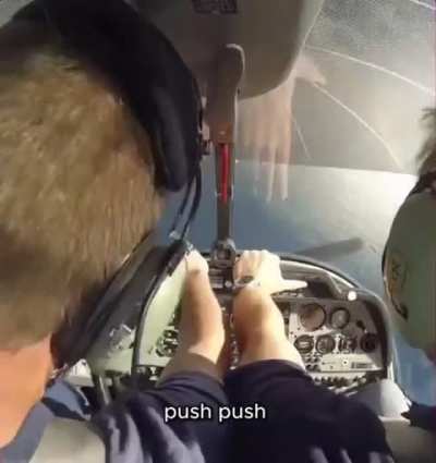 Instructor calmly guides student through spin recovery