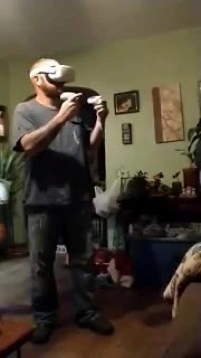 My dad tries out vr for the first time (creed demo)
