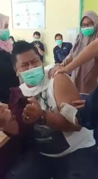 Extreme trypanophobia at one of Malaysia's vaccination centers.