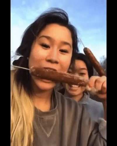 Taking a bite out of a cat tail.