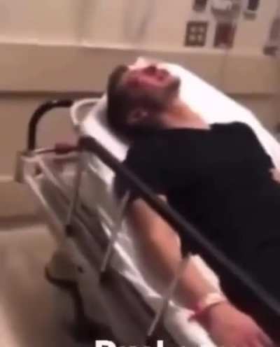 Getting slapped around by the police in a hospital.