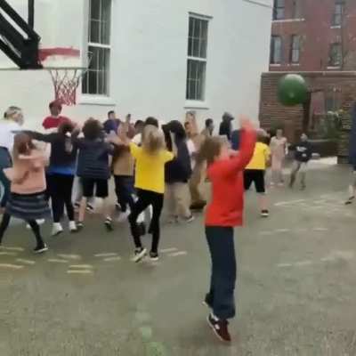 Third grade teacher Ms. Fitz promised her class hot chocolate if she made this shot