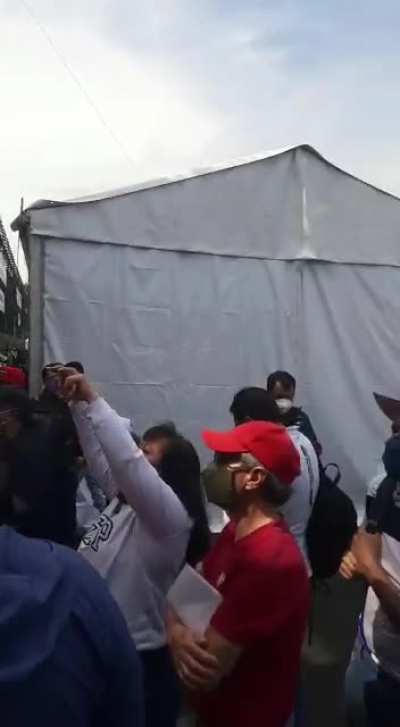 People mad outside of Mexico GP because stands were not finished on time.