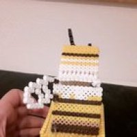 I made bee queen from ironing pearls i hope you like it
