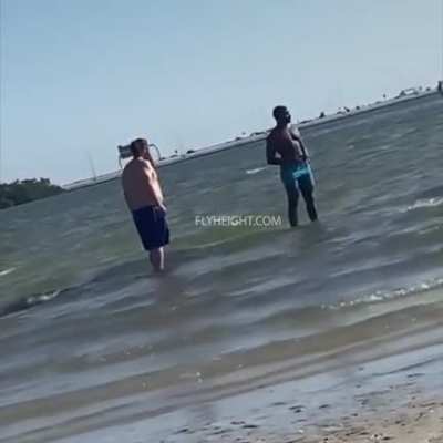 A Totally Normal Day At The Beach Until Someone Takes A Kick To The Jaw